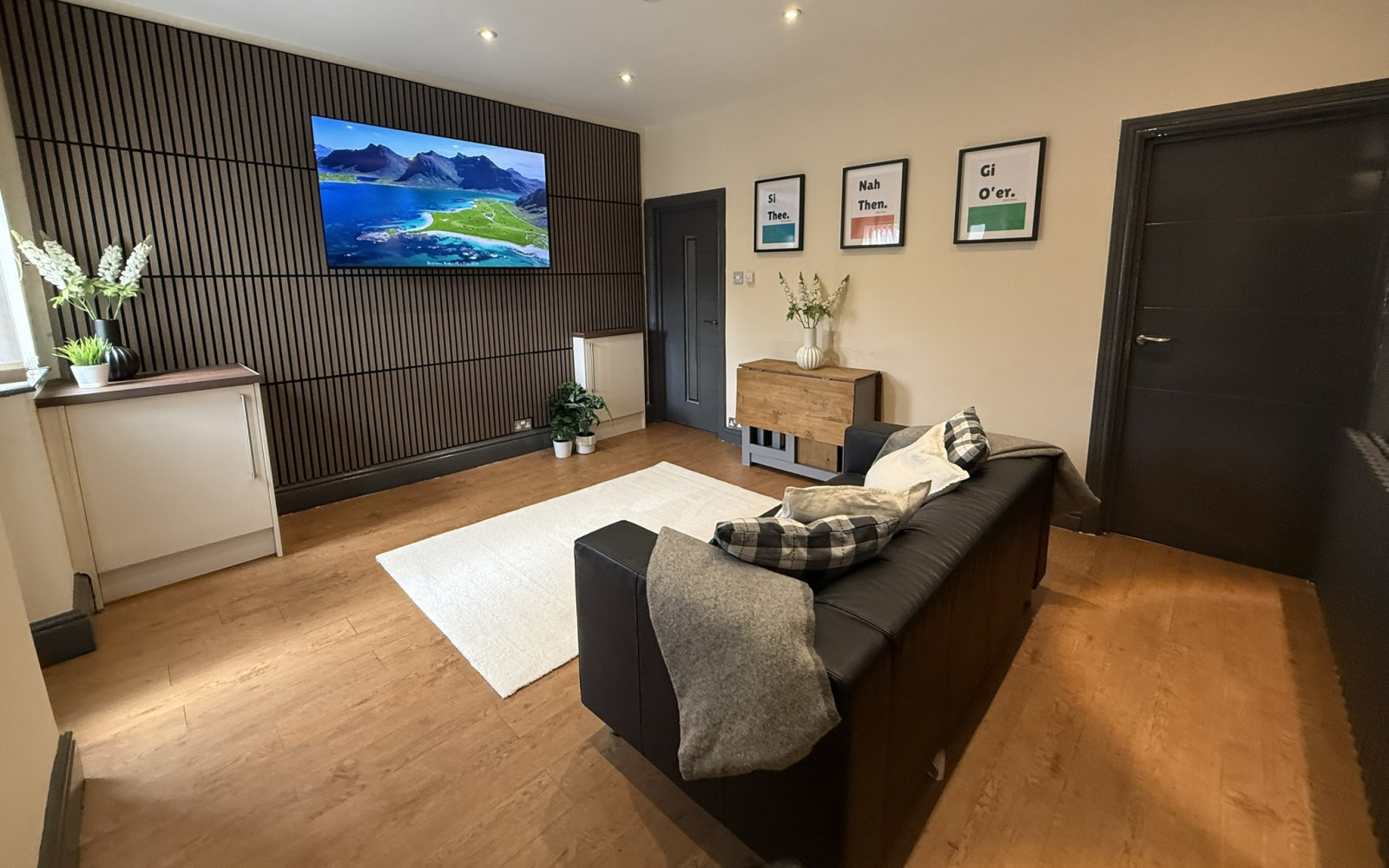 Lounge with 65 inch TV 